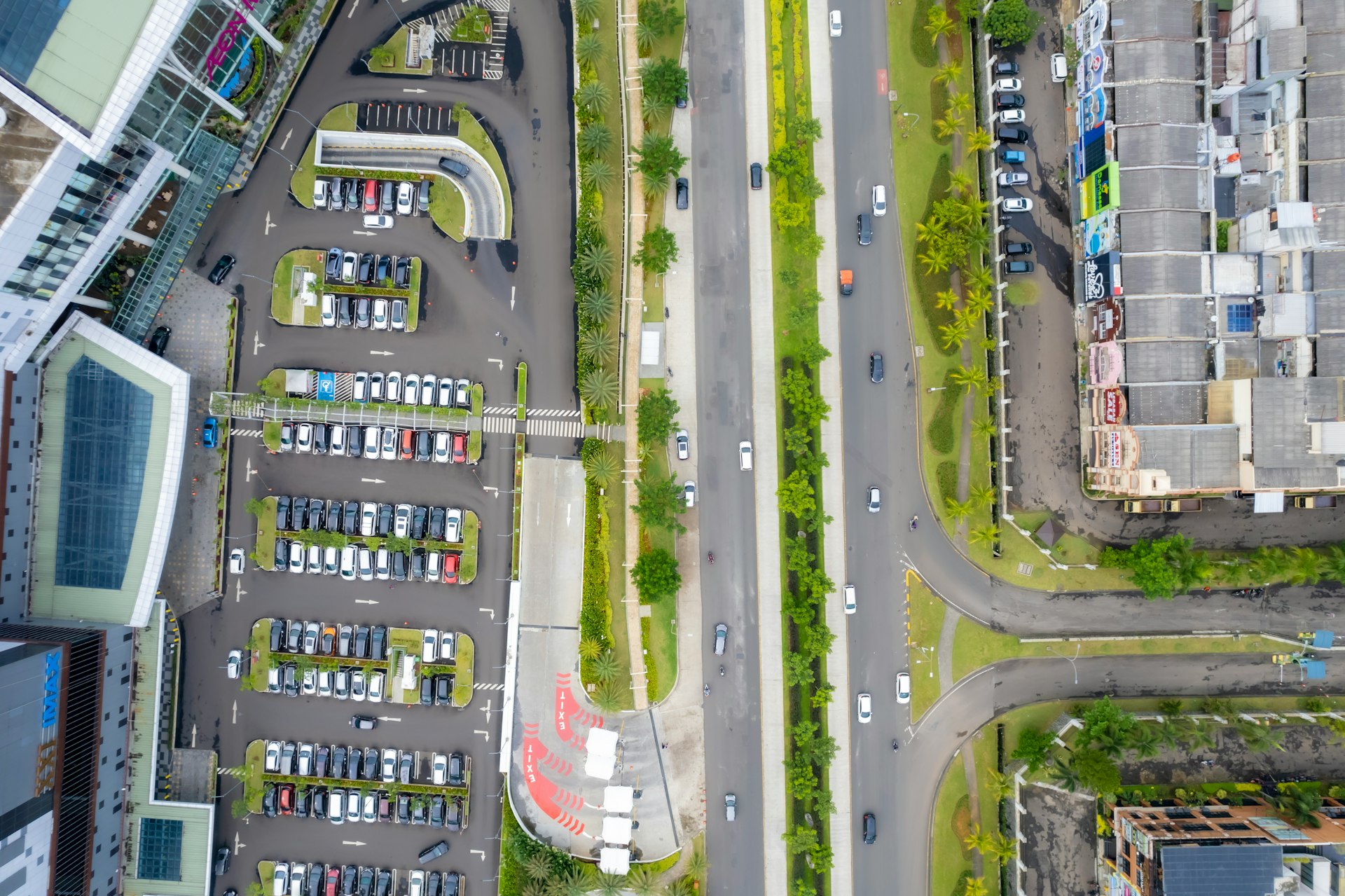 a road with cars and buildings